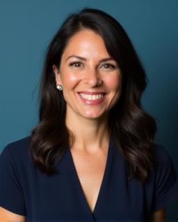 Headshot of Julia Moreno, CEO of Summit Advisory Group